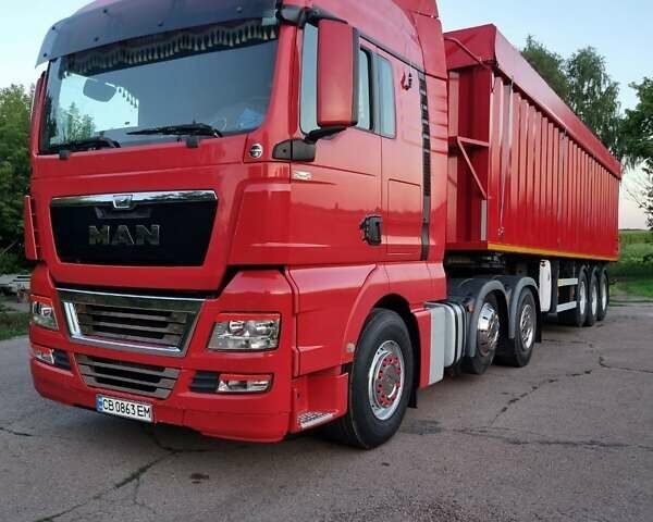 Красный МАН ТГКС, объемом двигателя 12.42 л и пробегом 100 тыс. км за 25550 $, фото 1 на Automoto.ua