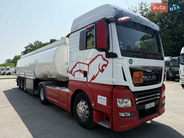 Красный МАН ТГКС, объемом двигателя 12.42 л и пробегом 800 тыс. км за 26900 $, фото 1 на Automoto.ua