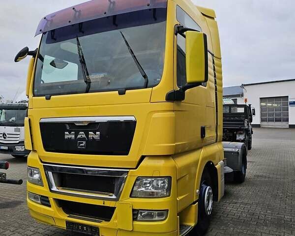 Желтый МАН ТГКС, объемом двигателя 10.5 л и пробегом 976 тыс. км за 18390 $, фото 1 на Automoto.ua