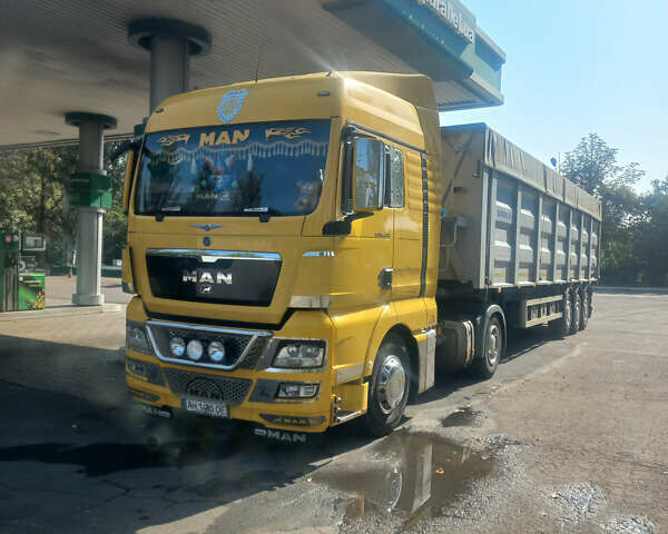 Желтый МАН ТГКС, объемом двигателя 10.52 л и пробегом 950 тыс. км за 32000 $, фото 1 на Automoto.ua