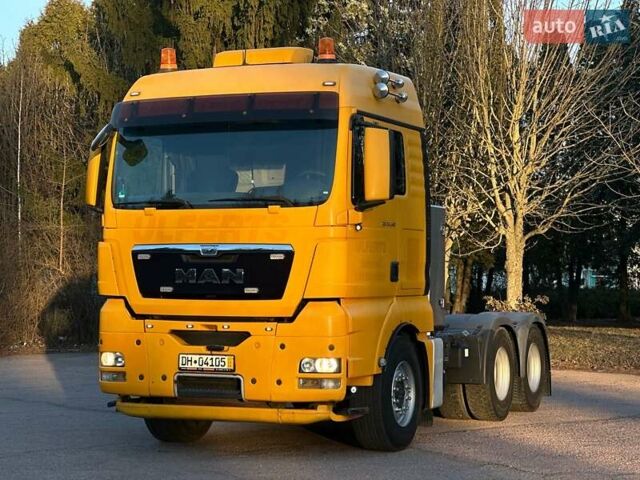 Желтый МАН ТГКС, объемом двигателя 12.5 л и пробегом 339 тыс. км за 46762 $, фото 1 на Automoto.ua