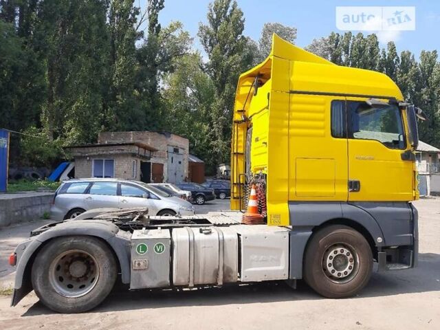 Желтый МАН ТГКС, объемом двигателя 12 л и пробегом 700 тыс. км за 40000 $, фото 1 на Automoto.ua