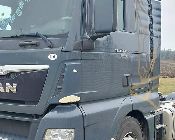 Серый МАН ТГКС, объемом двигателя 12.4 л и пробегом 916 тыс. км за 18500 $, фото 1 на Automoto.ua