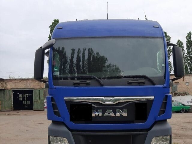Синий МАН ТГКС, объемом двигателя 12.4 л и пробегом 650 тыс. км за 39000 $, фото 1 на Automoto.ua