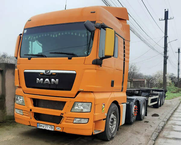 Оранжевый МАН ТГКС, объемом двигателя 12.4 л и пробегом 820 тыс. км за 17400 $, фото 1 на Automoto.ua