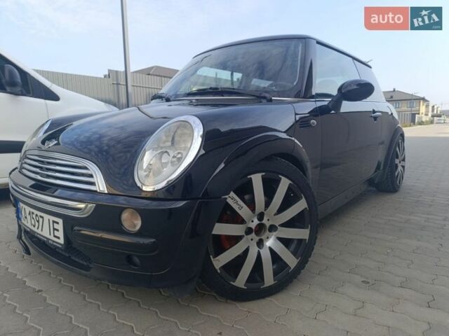 Черный Мини Купер, объемом двигателя 1.6 л и пробегом 251 тыс. км за 4200 $, фото 1 на Automoto.ua