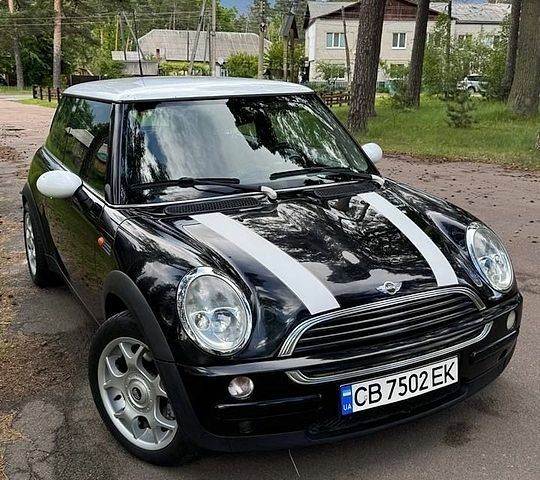Черный Мини Купер, объемом двигателя 1.6 л и пробегом 256 тыс. км за 4700 $, фото 1 на Automoto.ua
