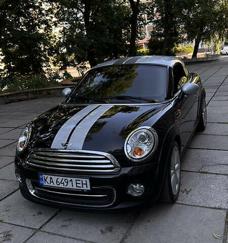 Чорний Міні Cooper, об'ємом двигуна 1.6 л та пробігом 77 тис. км за 9000 $, фото 1 на Automoto.ua