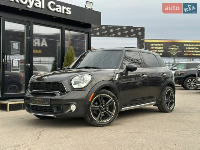 Черный Мини Купер, объемом двигателя 1.6 л и пробегом 143 тыс. км за 12800 $, фото 1 на Automoto.ua