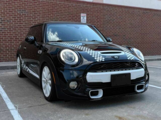 Чорний Міні Cooper, об'ємом двигуна 2 л та пробігом 110 тис. км за 3497 $, фото 1 на Automoto.ua