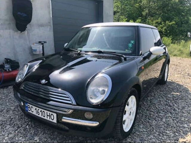Черный Мини Купер, объемом двигателя 1.6 л и пробегом 200 тыс. км за 4100 $, фото 1 на Automoto.ua