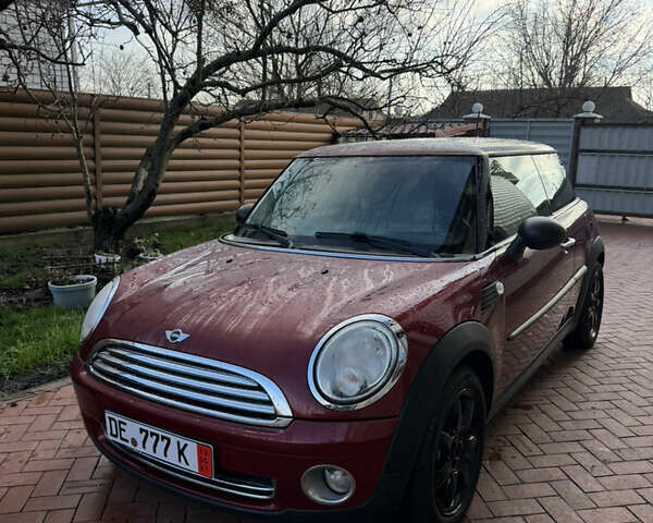 Красный Мини Купер, объемом двигателя 1.4 л и пробегом 126 тыс. км за 5700 $, фото 1 на Automoto.ua