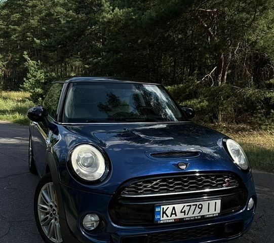 Синій Міні Cooper, об'ємом двигуна 2 л та пробігом 227 тис. км за 9900 $, фото 1 на Automoto.ua
