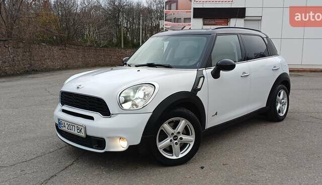 Белый Мини Кантримен, объемом двигателя 1.6 л и пробегом 209 тыс. км за 10400 $, фото 1 на Automoto.ua