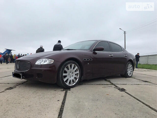 Червоний Мазераті Quattroporte, об'ємом двигуна 4.2 л та пробігом 148 тис. км за 14000 $, фото 1 на Automoto.ua