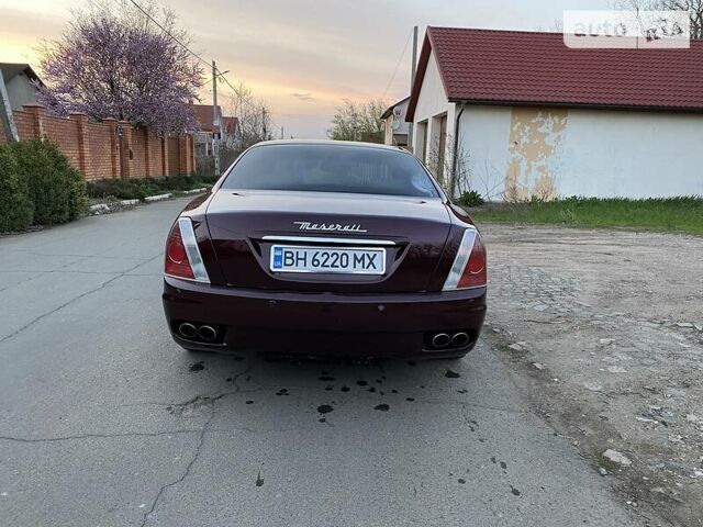 Червоний Мазераті Quattroporte, об'ємом двигуна 4.2 л та пробігом 141 тис. км за 8500 $, фото 1 на Automoto.ua