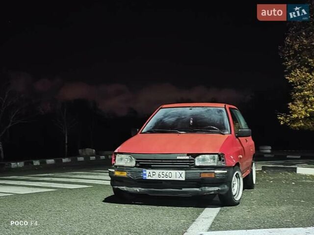 Красный Мазда 121, объемом двигателя 1.3 л и пробегом 290 тыс. км за 850 $, фото 1 на Automoto.ua