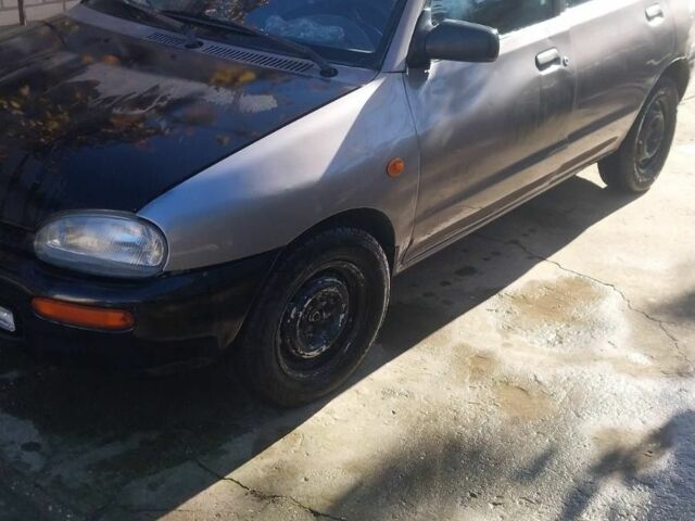 Серый Мазда 121, объемом двигателя 0 л и пробегом 250 тыс. км за 1700 $, фото 1 на Automoto.ua