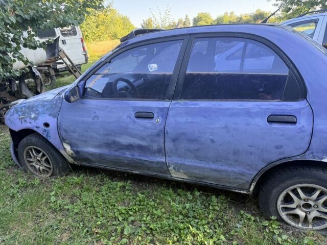 Синий Мазда 121, объемом двигателя 1.2 л и пробегом 2 тыс. км за 671 $, фото 1 на Automoto.ua