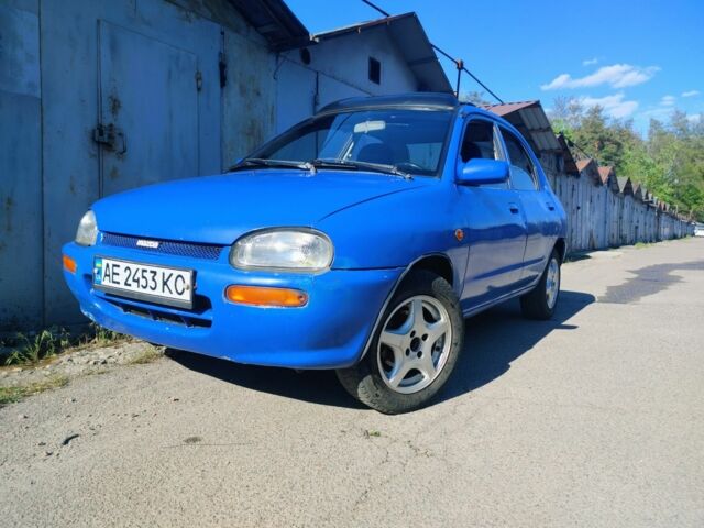 Синій Мазда 121, об'ємом двигуна 1.3 л та пробігом 283 тис. км за 592 $, фото 1 на Automoto.ua