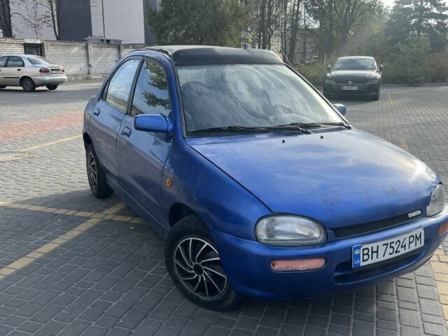 Синій Мазда 121, об'ємом двигуна 1.3 л та пробігом 347 тис. км за 999 $, фото 1 на Automoto.ua