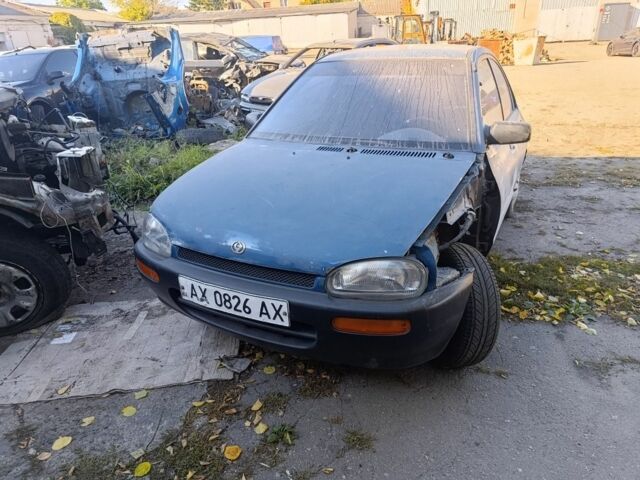 Синий Мазда 121, объемом двигателя 1.3 л и пробегом 123 тыс. км за 903 $, фото 1 на Automoto.ua