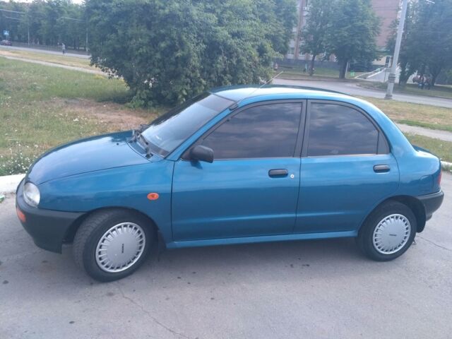 Синій Мазда 121, об'ємом двигуна 1.3 л та пробігом 240 тис. км за 2100 $, фото 1 на Automoto.ua