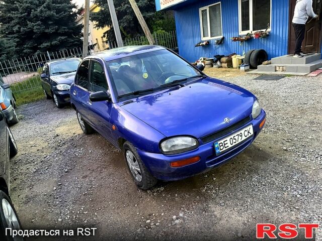 Синий Мазда 121, объемом двигателя 1.3 л и пробегом 214 тыс. км за 1300 $, фото 1 на Automoto.ua