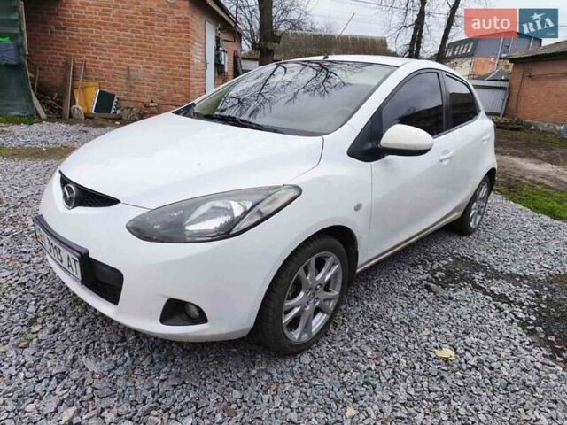Білий Мазда 2, об'ємом двигуна 1.5 л та пробігом 165 тис. км за 5550 $, фото 1 на Automoto.ua