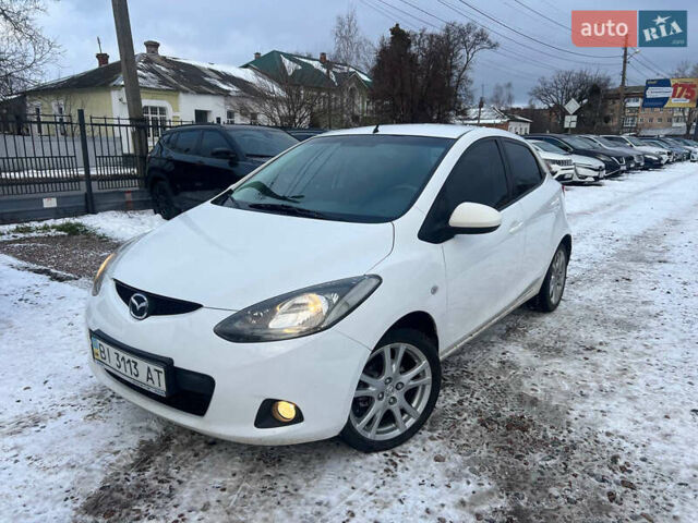 Білий Мазда 2, об'ємом двигуна 1.5 л та пробігом 170 тис. км за 5800 $, фото 1 на Automoto.ua