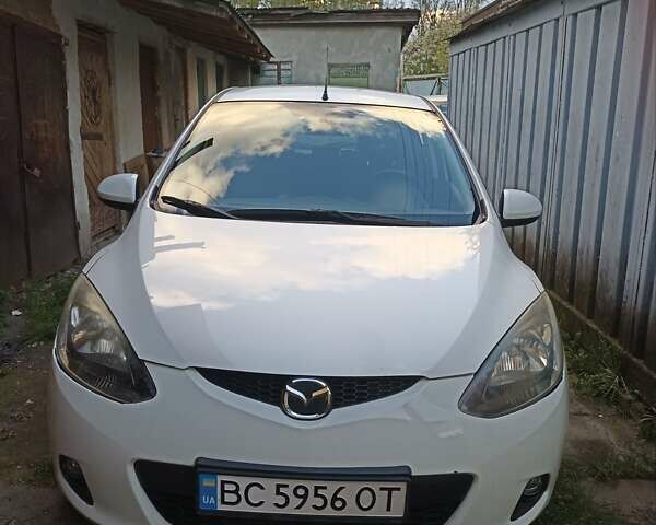 Білий Мазда 2, об'ємом двигуна 1.5 л та пробігом 111 тис. км за 7500 $, фото 1 на Automoto.ua
