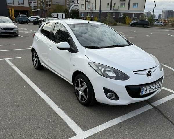 Білий Мазда 2, об'ємом двигуна 1.5 л та пробігом 135 тис. км за 7654 $, фото 1 на Automoto.ua