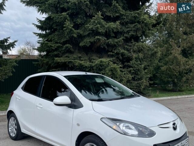Белый Мазда 2, объемом двигателя 1.5 л и пробегом 74 тыс. км за 8150 $, фото 1 на Automoto.ua