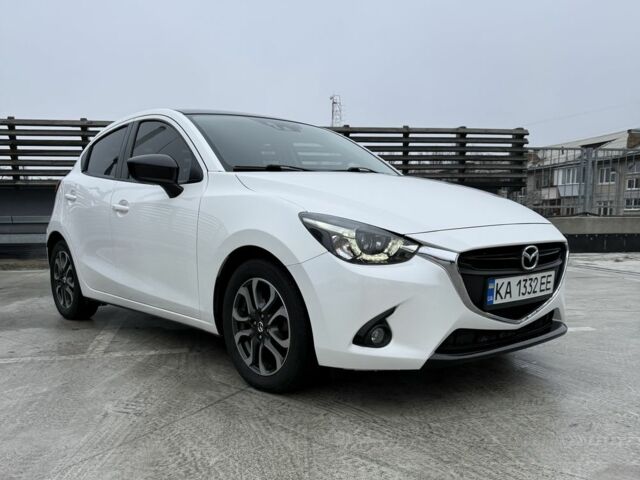 Белый Мазда 2, объемом двигателя 1.5 л и пробегом 75 тыс. км за 273 $, фото 1 на Automoto.ua