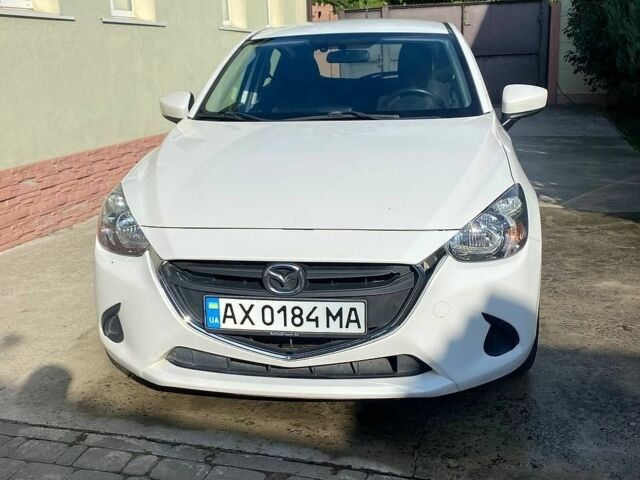 Білий Мазда 2, об'ємом двигуна 1.5 л та пробігом 91 тис. км за 11500 $, фото 1 на Automoto.ua