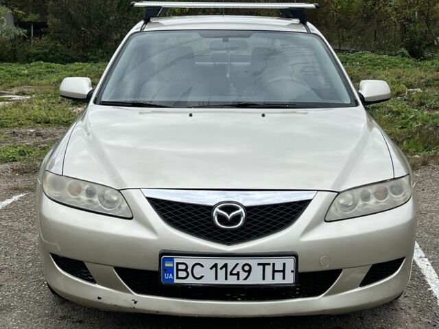Бежевый Мазда 2, объемом двигателя 2 л и пробегом 310 тыс. км за 3200 $, фото 1 на Automoto.ua
