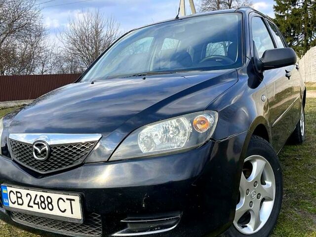 Чорний Мазда 2, об'ємом двигуна 13 л та пробігом 300 тис. км за 2900 $, фото 1 на Automoto.ua