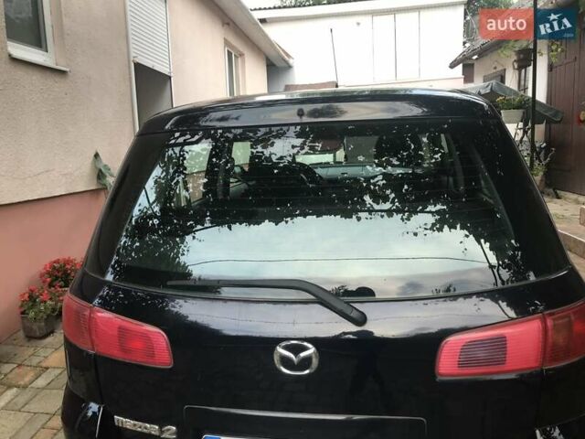 Черный Мазда 2, объемом двигателя 0 л и пробегом 210 тыс. км за 3600 $, фото 1 на Automoto.ua