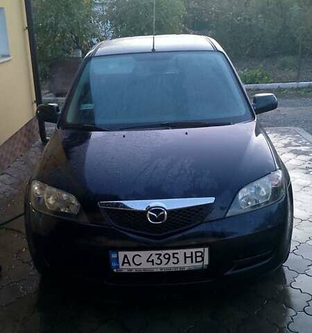 Черный Мазда 2, объемом двигателя 1.4 л и пробегом 237 тыс. км за 4300 $, фото 1 на Automoto.ua