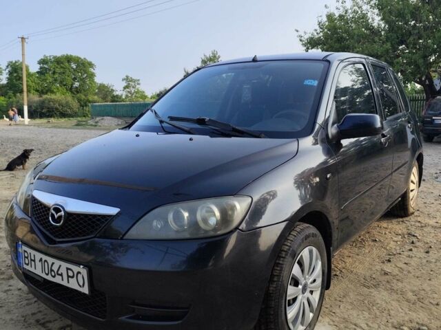 Чорний Мазда 2, об'ємом двигуна 1.4 л та пробігом 205 тис. км за 3700 $, фото 1 на Automoto.ua