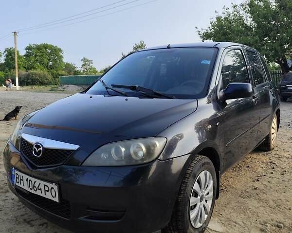 Чорний Мазда 2, об'ємом двигуна 1.4 л та пробігом 205 тис. км за 3700 $, фото 1 на Automoto.ua