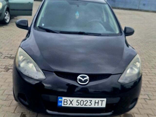 Чорний Мазда 2, об'ємом двигуна 1.35 л та пробігом 160 тис. км за 4650 $, фото 1 на Automoto.ua