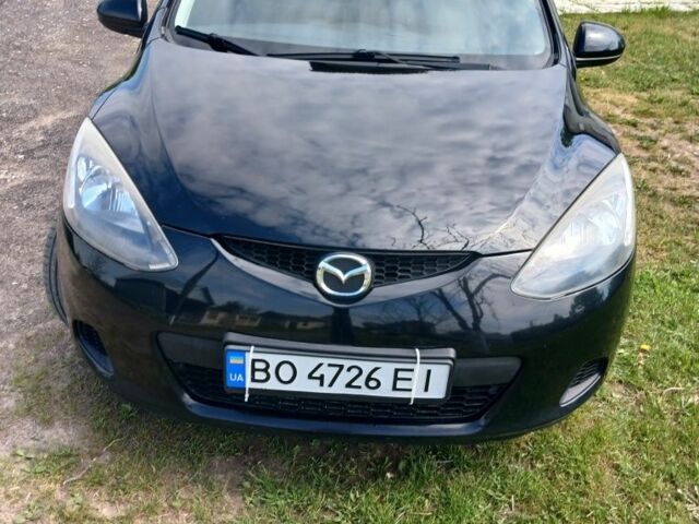 Черный Мазда 2, объемом двигателя 1.3 л и пробегом 261 тыс. км за 4150 $, фото 1 на Automoto.ua