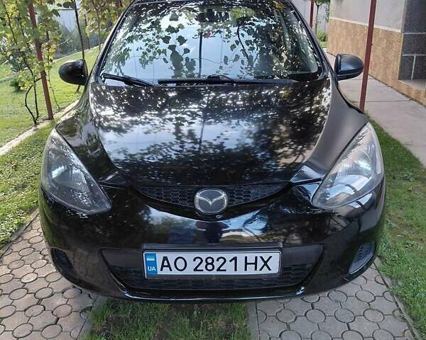 Чорний Мазда 2, об'ємом двигуна 1.4 л та пробігом 300 тис. км за 3700 $, фото 1 на Automoto.ua