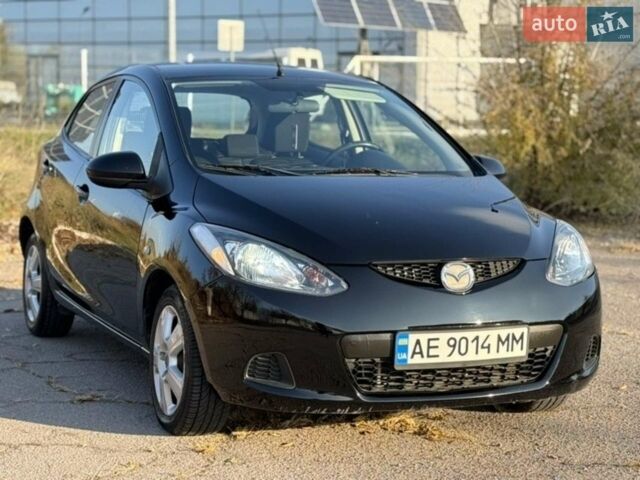 Черный Мазда 2, объемом двигателя 1.4 л и пробегом 186 тыс. км за 4999 $, фото 1 на Automoto.ua