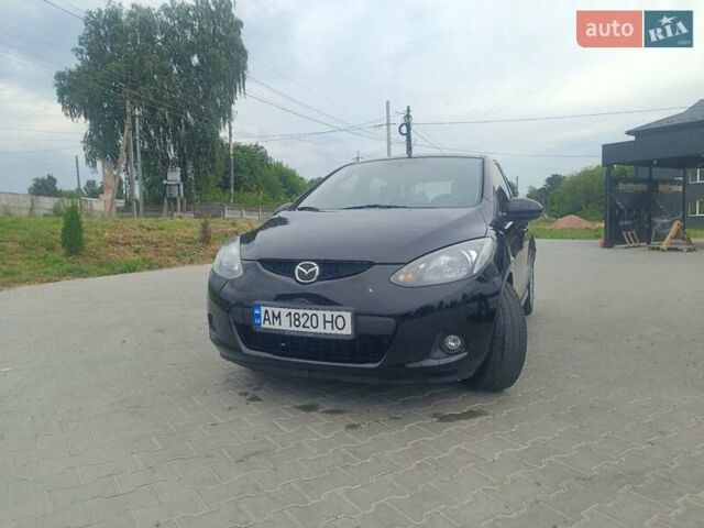Черный Мазда 2, объемом двигателя 1.4 л и пробегом 195 тыс. км за 4900 $, фото 1 на Automoto.ua