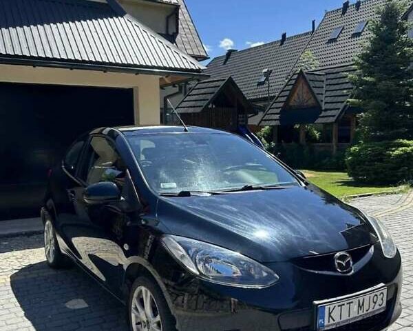 Чорний Мазда 2, об'ємом двигуна 1.5 л та пробігом 196 тис. км за 5977 $, фото 1 на Automoto.ua