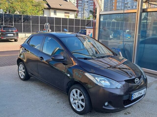 Чорний Мазда 2, об'ємом двигуна 1.5 л та пробігом 220 тис. км за 4200 $, фото 1 на Automoto.ua