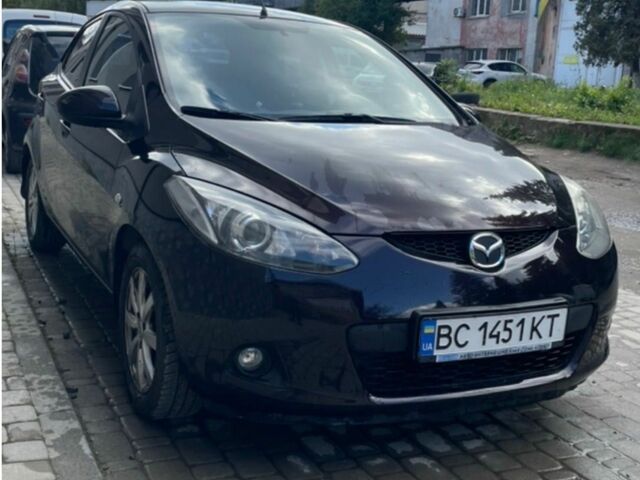 Чорний Мазда 2, об'ємом двигуна 1.5 л та пробігом 146 тис. км за 5100 $, фото 1 на Automoto.ua