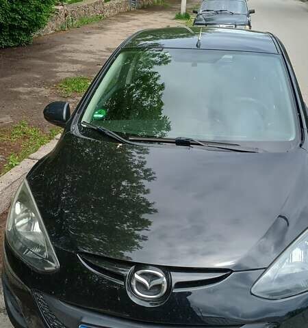 Чорний Мазда 2, об'ємом двигуна 1.3 л та пробігом 114 тис. км за 5900 $, фото 1 на Automoto.ua
